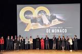 GP La légende 4 - T.S.H. Prince Albert II and Princess Charlene surrounded by the key players involved in the documentary "Monaco Grand Prix: The Legend" © Government Communication Department / Manuel Vitali