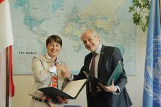 Signaure accord ONU MC lutte drogue et crime - H.E. Ms Isabelle Berro-Amadeï, the Principality of Monaco’s Ambassador and Permanent Representative to the UNODC, and Jean-Luc Lemahieu, UNODC Director of Policy Analysis and Public Affairs – © – DR
