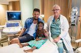 MCH-Olivier Giroud-©CCM-Philippe Fitte - Olivier Giroud, Monaco Humanitarian Collective (MCH) Ambassador, with Fanta, the 300th child to receive surgery thanks to the MCH, and Dr François Bourlon, paediatric cardiologist at the Cardiothoracic Centre. © CCM/Philippe Fitte
